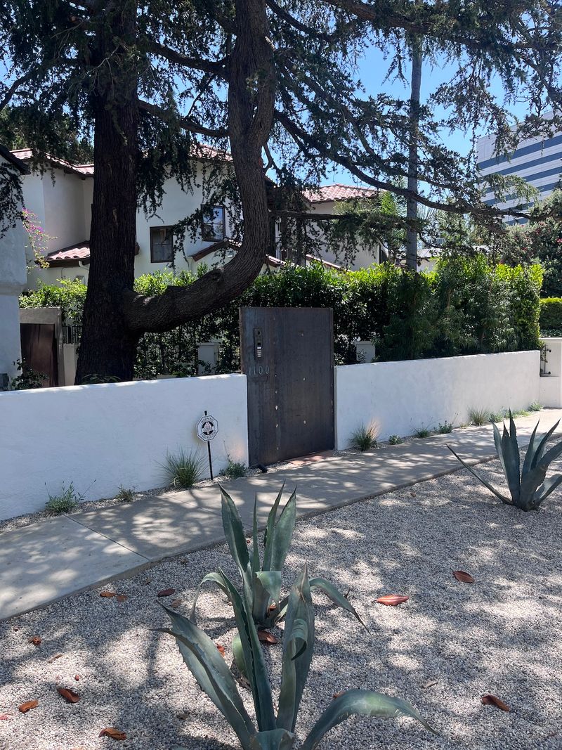 CMU wall with stucco and Corten gate