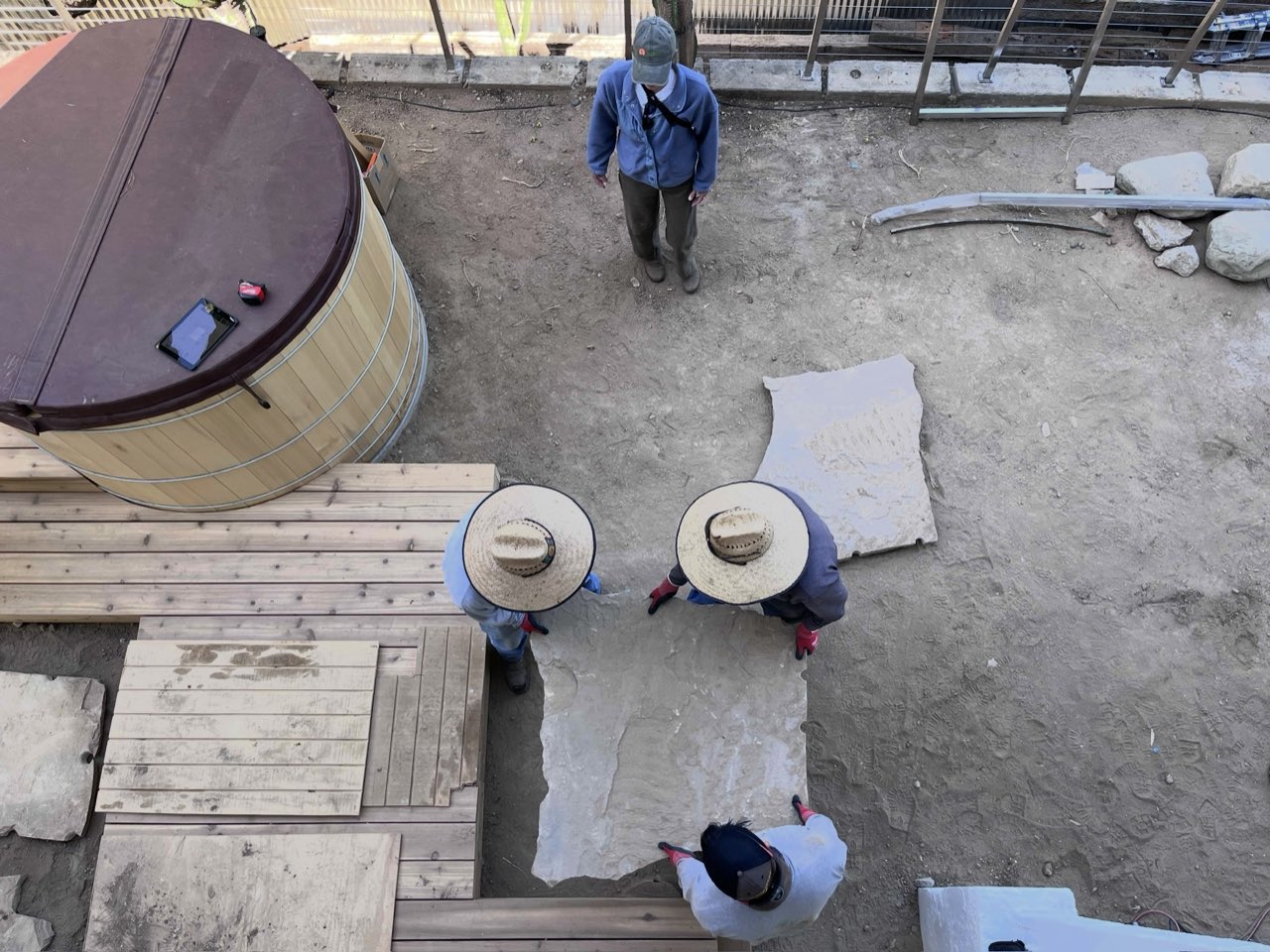 Flagstone install with cedar hot tub